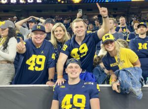 Desi and family at football game